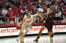 Randy Davis driving the ball in the game against Southern Illinois in arena on Saterday. DN PHOTO ASHLEY XING